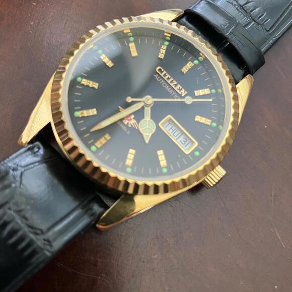 Citizen Eagle 7 Black and Gold Automatic Men's 36mm Gold Fluted Bezel Watch